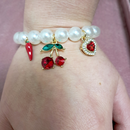 Bracciale con Perle e Pendenti Cuore, Ciliegie e Corno